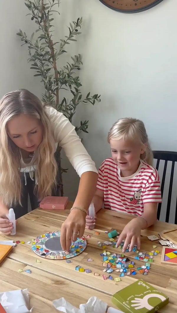 Kids and parent making Sculpd mosaic