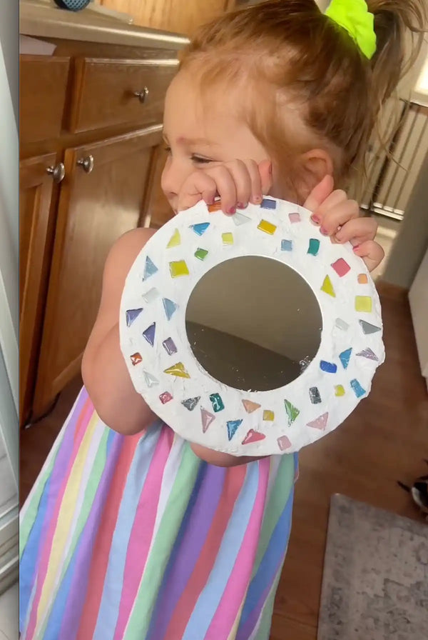 Sculpd Mosaic Kit - Child showing her finished mirror