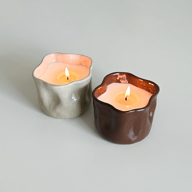 Two dented candle making creation